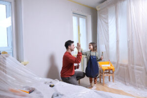 father and daughter painting room